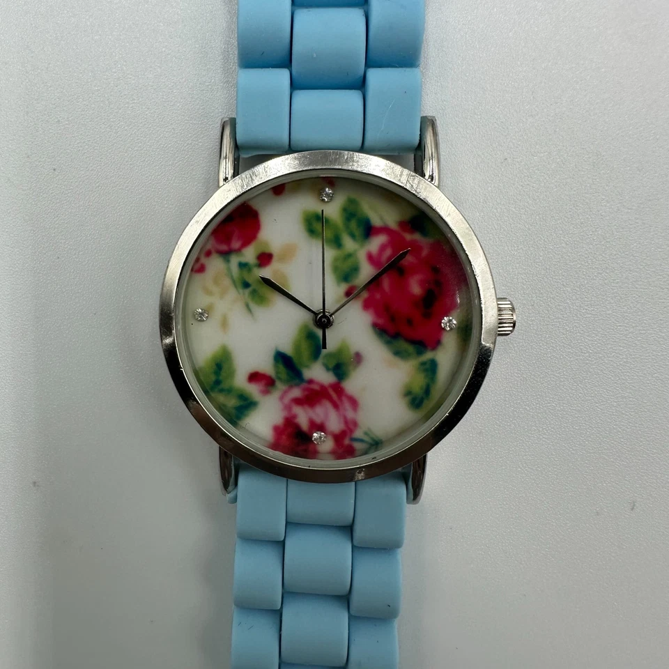 Relógio Geneva Feminino Tom Prata Mostrador Floral Pulseira de Silicone Azul Nova Bateria 9" - Imagem 2 de 4