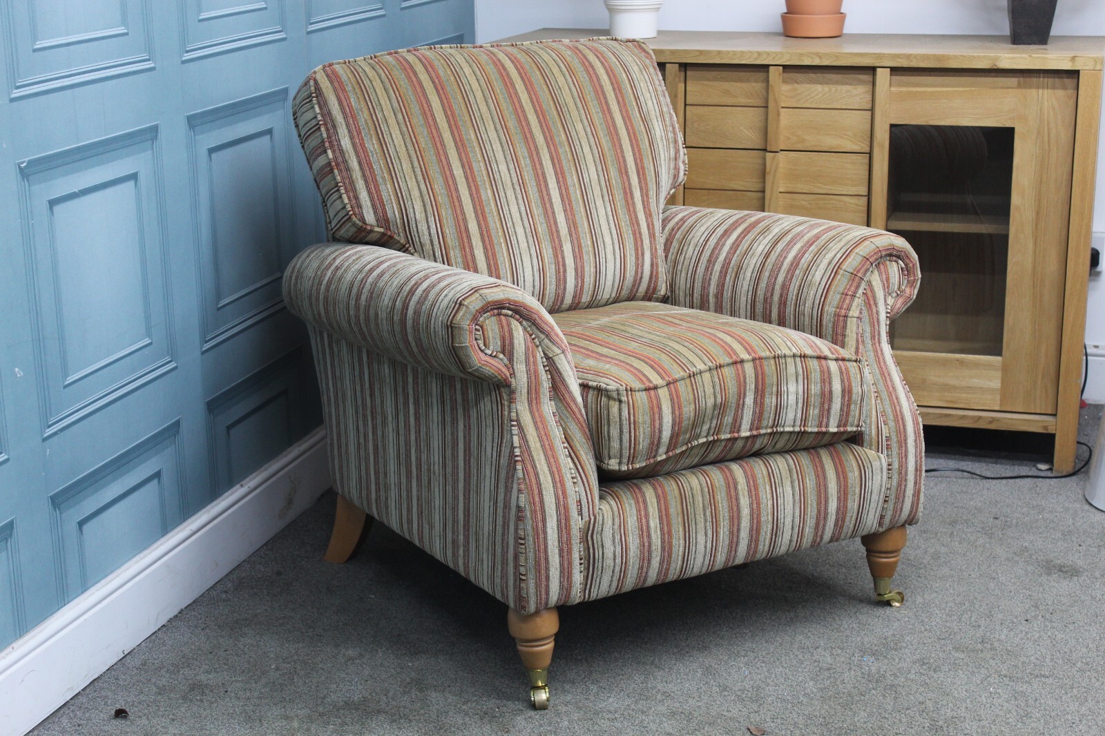 PARKER KNOLL WESTBURY ARMCHAIR ON BASLOW STRIPE GOLD FABRIC. RRP £1217