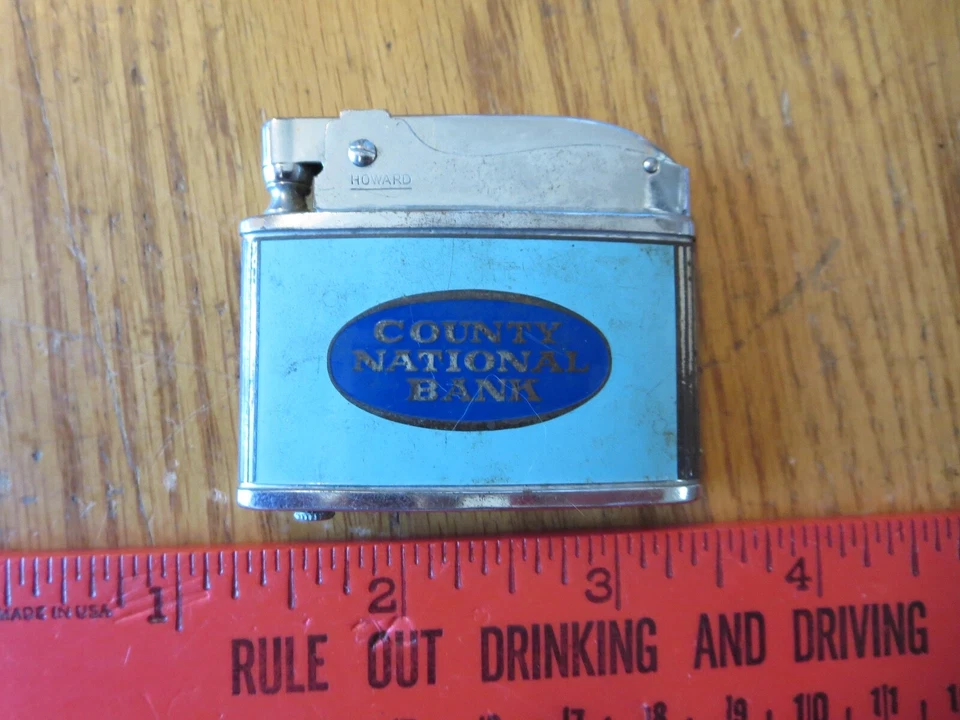 Publicidad vintage Howard Lighter County National Bank Japón esmaltado Foto 2 de 4