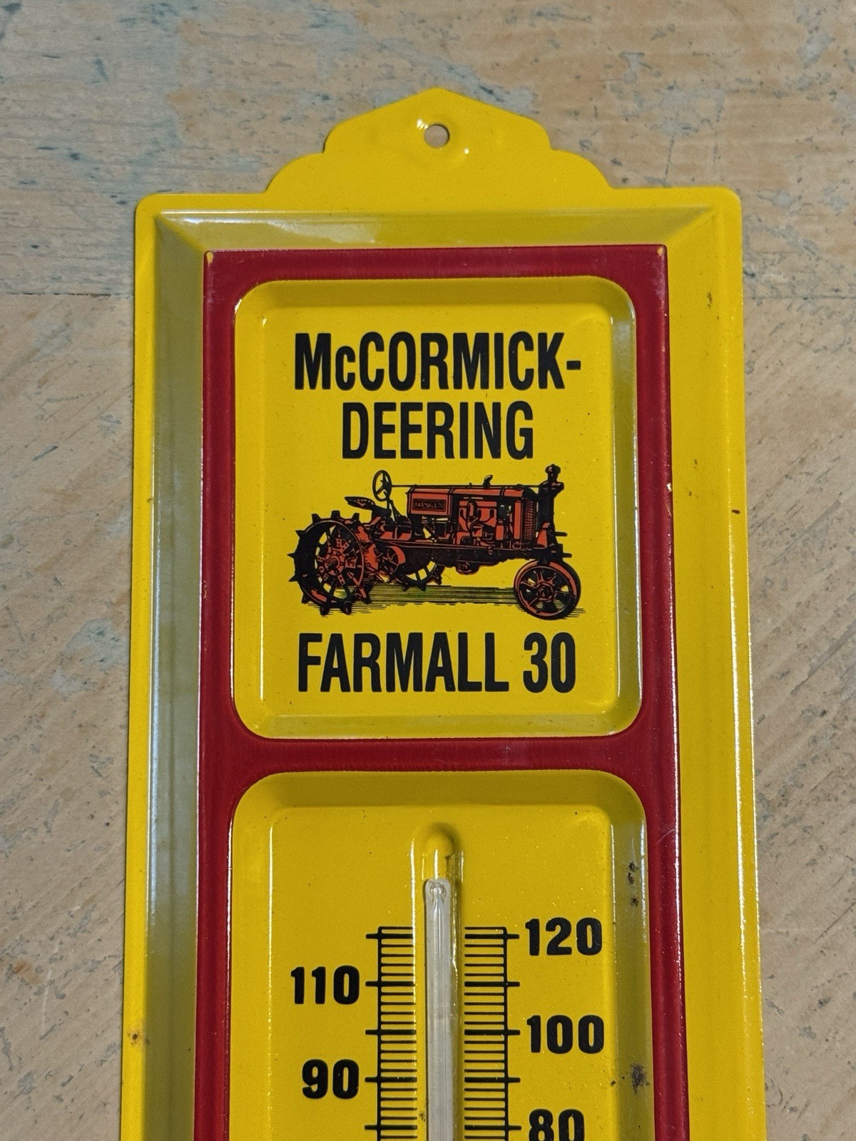 McCORMICK - DEERING FARMALL 30 SOLD HERE Advertising Embossed Thermometer