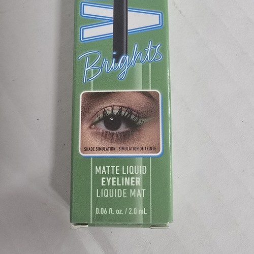 NYX Colored Liquid Eyeliner Ghosted Green VBLL02 box with black-brown eye look and blue NYX logo.