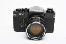 Canon F-1 35mm SLR Camera w/50mm F1.4 Prime, Hood, Case, New seals, Great