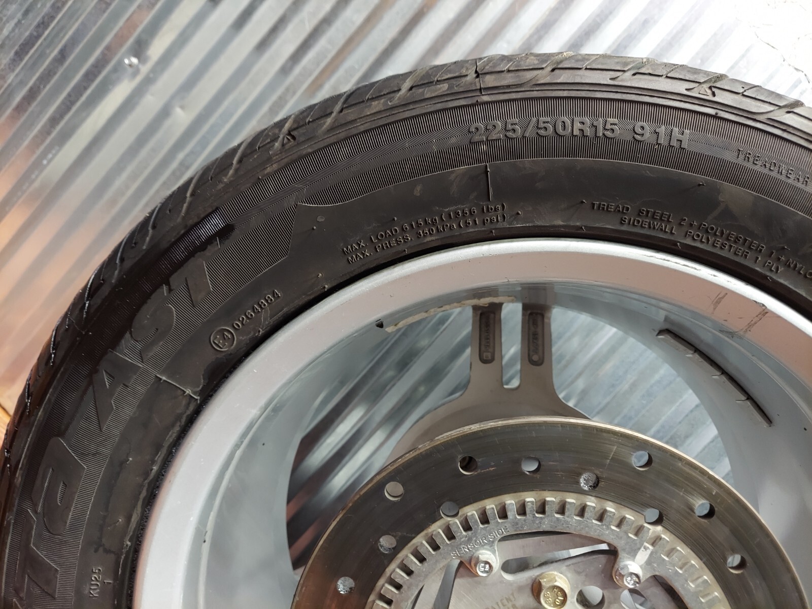 10 Can Am Spyder Roadster RT REAR WHEEL RIM W TIRE & ROTOR 