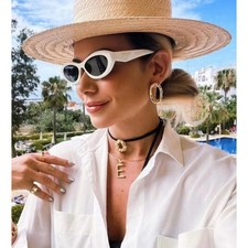 Prada PR26ZS 17K08Z Oval Sunglasses in White /Gray Lens 100 UV