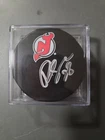 Damon Severson autographed signed puck NHL New Jersey Devils