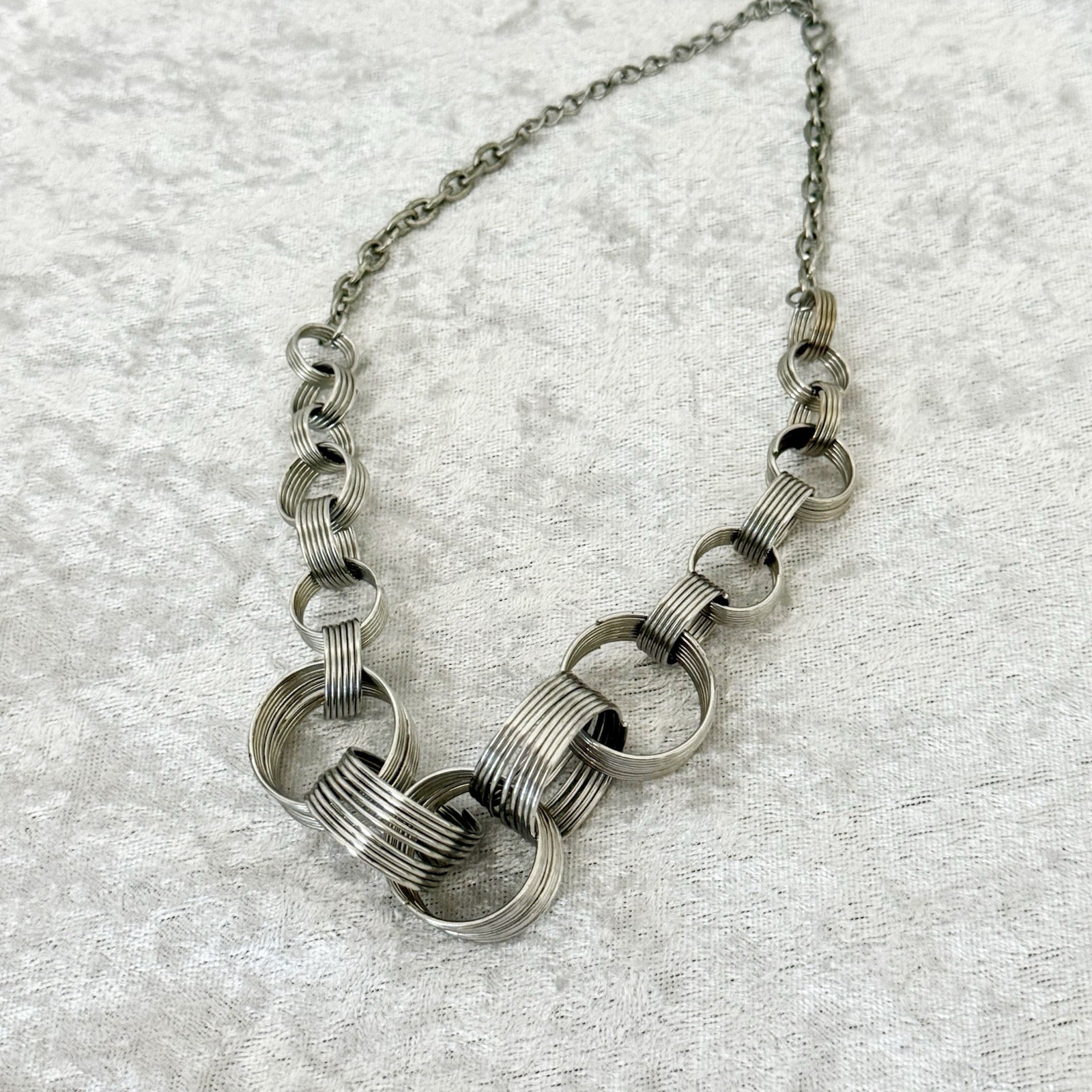 Unique Silver-Toned Interlocking Spirals Coil  Li… - image 2