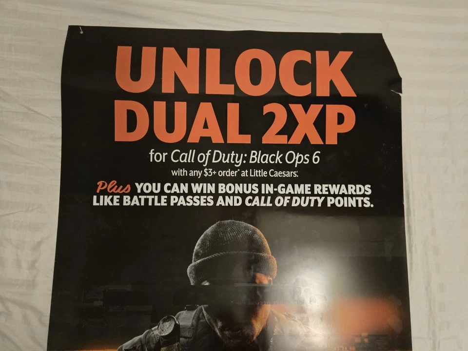 PÓSTER DE EXHIBICIÓN LITTLE CAESARS: CALL OF DUTY BLACK OPS 6  Foto 4 de 4