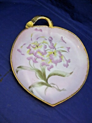 DECORATIVE ANTIQUE SERVING PLATE WITH HANDLE.   MARKED: CFH-GDM- #638 XMOSYO