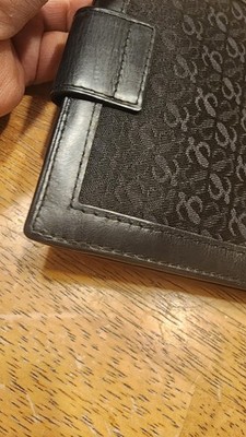 Loewe black canvas & leather bifold wallet featuring the iconic