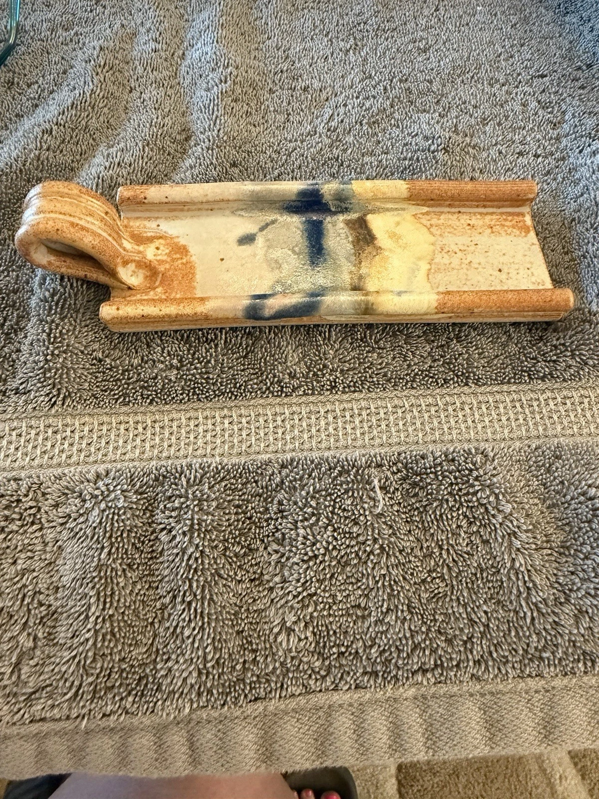 Dirtworks ceramic Pottery butter dish featuring blue and earth-tone glazes.