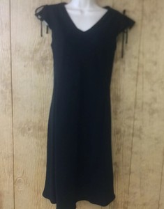 flowy black dress with flutter cap sleeves