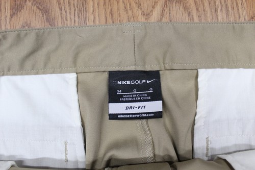 NIKE GOLF DRI-FIT REGULAR FIT PANTALONES CORTOS POLI/SPANDEX CAQUI Talla 34 - Imagen 2 de 3