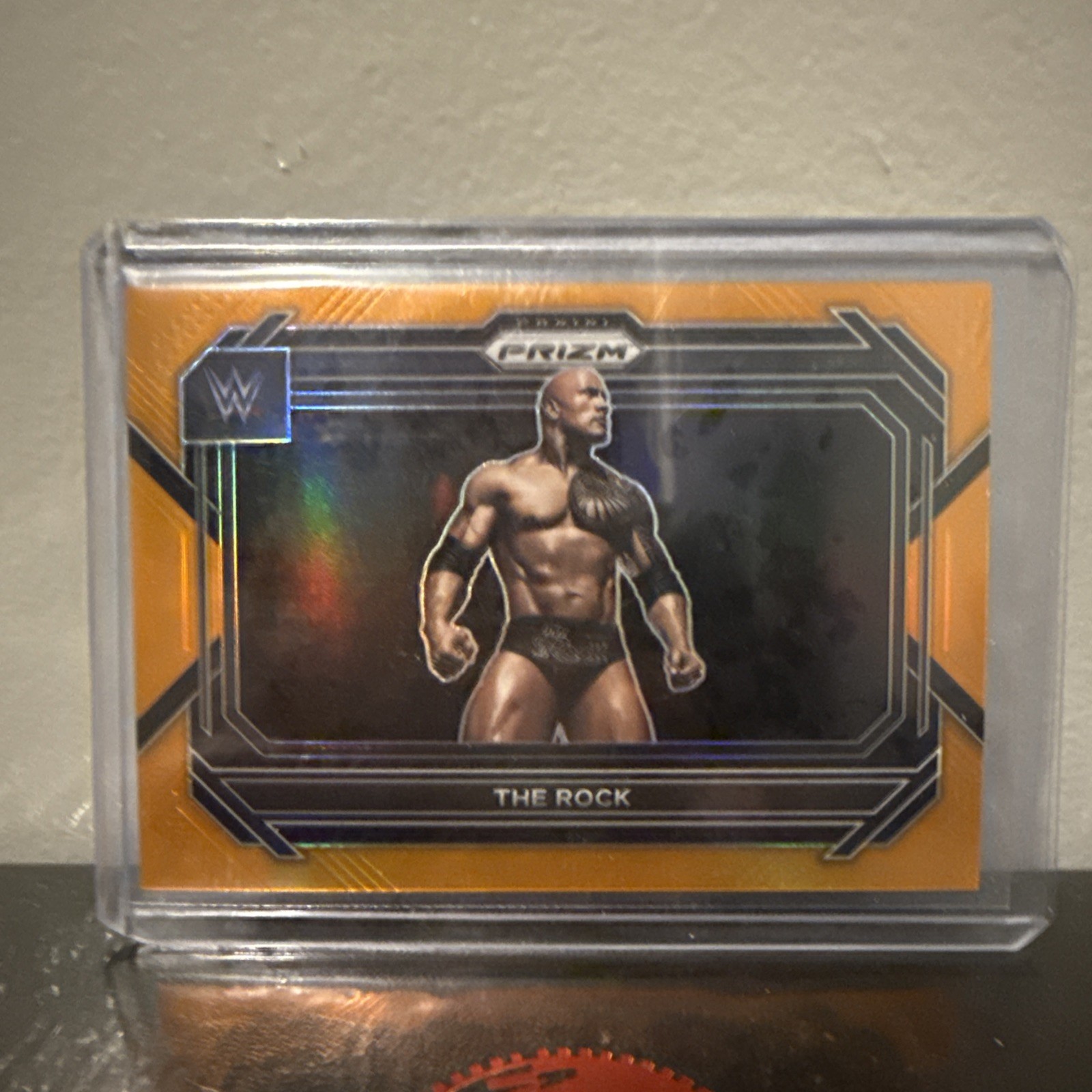 2023 Panini Prizm WWE - The Rock #41 Orange Prizm /99