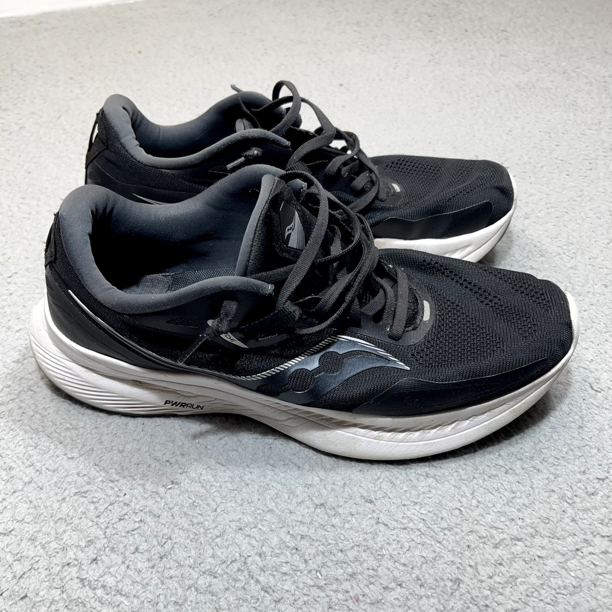 Black saucony on sale trainers