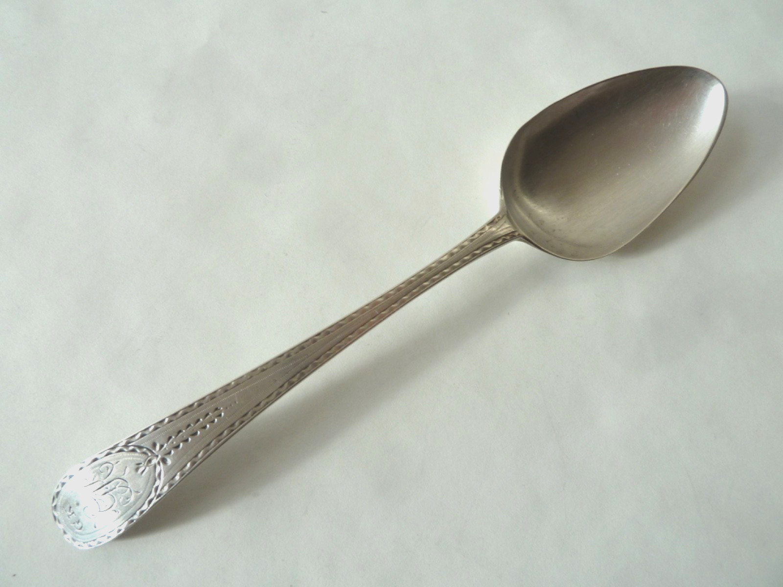 HESTER BATEMAN STERLING TABLESPOON,  ENGRAVED "GK" IN THE RESERVE, 1785 LONDON