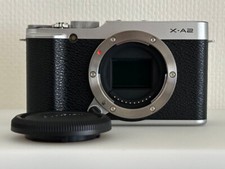 FUJIFILM X-A2 body with dedicated half case - in good condition