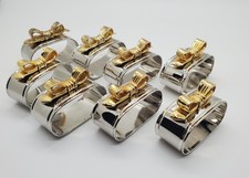 Vintage set of 8 silver plated oval napkin rings with gold tone bows
