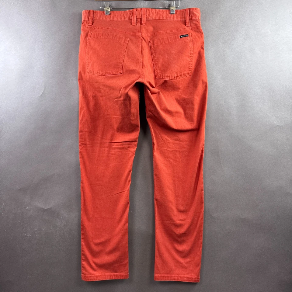 Pantalones de mezclilla Oakley para hombre 36x32 naranja golf campo de conducción oficina trabajo ajustados Foto 3 de 4