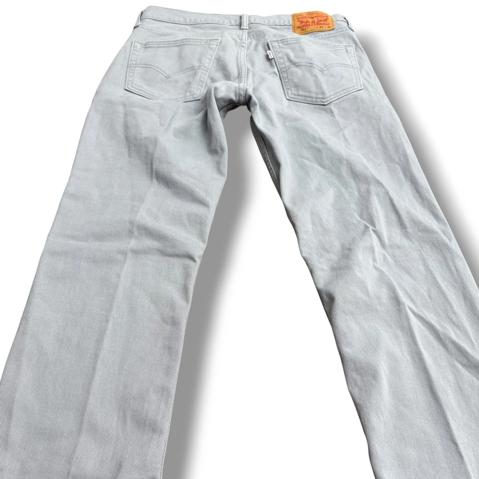Pantalones de mezclilla ajustados gris claro Levi Strauss & Co 511 para hombre W34 L32 lengüeta blanca Foto 4 de 4