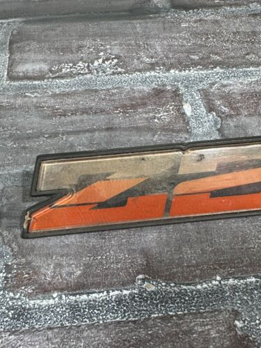 1982-1987 CAMARO Z28 ROCKER EMBLEM (20313783) Original Faded Red Oem Dirty - Picture 2 of 12