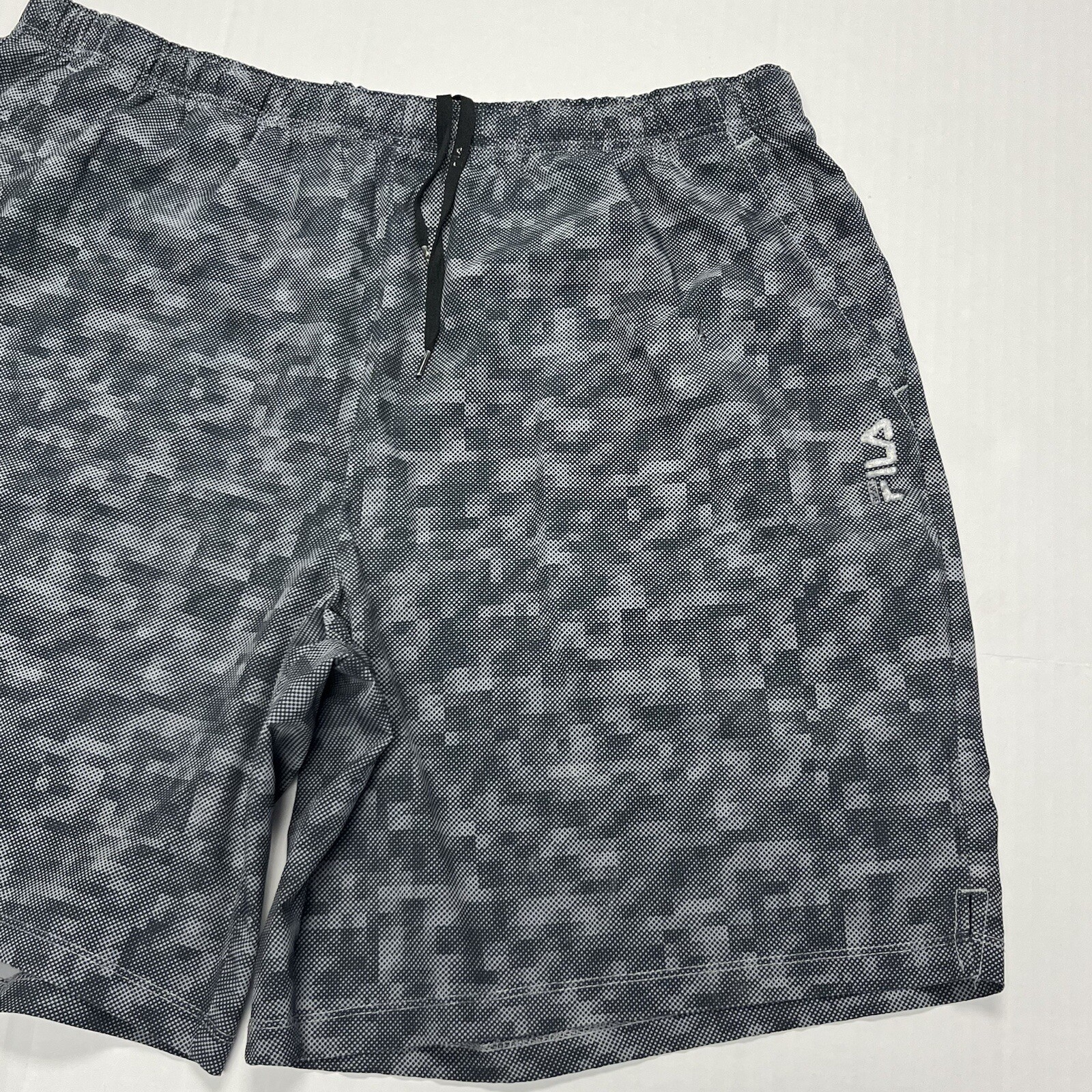 Pantaloncini sportivi Fila Sport Live In Motion corsa uomo grandi grigi Geo Hole coscia