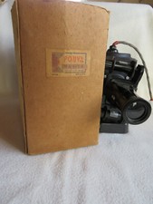 Stary projektor do folii rolkowej 35 mm - Pouva Magica z oryginalnym opakowaniem + 4 filmy
