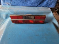 84 85 CELEBRITY RIGHT TAIL LIGHT SEDAN CHROME TRIM 79007