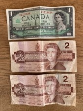 (2) 1986 Canadian 2 Dollar Bills & (1) 1967 Canada 1 Dollar Bill No Tears Good