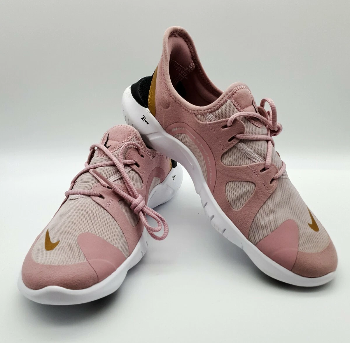 Nike free rn rose clearance gold
