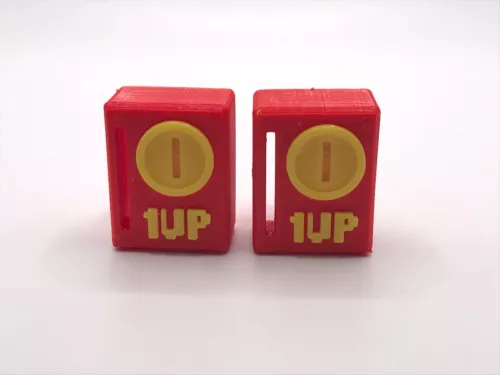 The Super Mario Bros Pinball Coin Reject Buttons