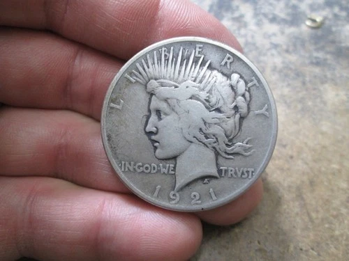 1921 US PEACE SILVER DOLLAR IN FINE CONDITION