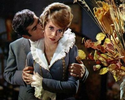 Jane Fonda gets kissed on neck by unidentified actor 8x10 inch photo