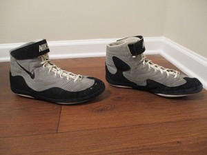 black and gold nike inflict wrestling shoes