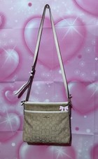 Coach Beige Logo Shoulder Bag Bow Charm Adjustable Strap Zip Closure Inner Pock  