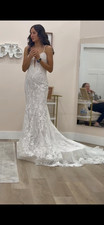 wedding dress size 10 never worn with tags on it from blush  ivory