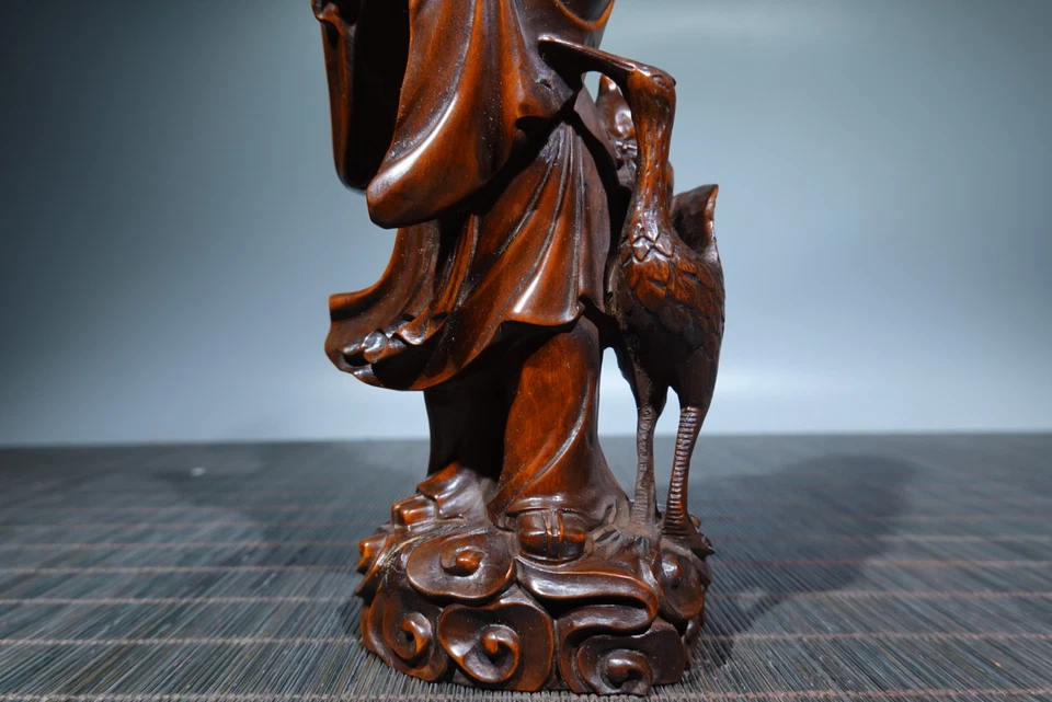 Estatua de pie de niño grúa blanca tallada en madera de caja china de 6,9" Foto 4 de 4