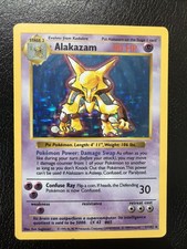 Pokémon Alakazam TCG Card 1/102 Base Set, Shadowless, Unlimited Holo Rare MP