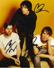 * THE CRIBS * signed 8x10 photo * GARY, RYAN & ROSS JARMAN * COA *