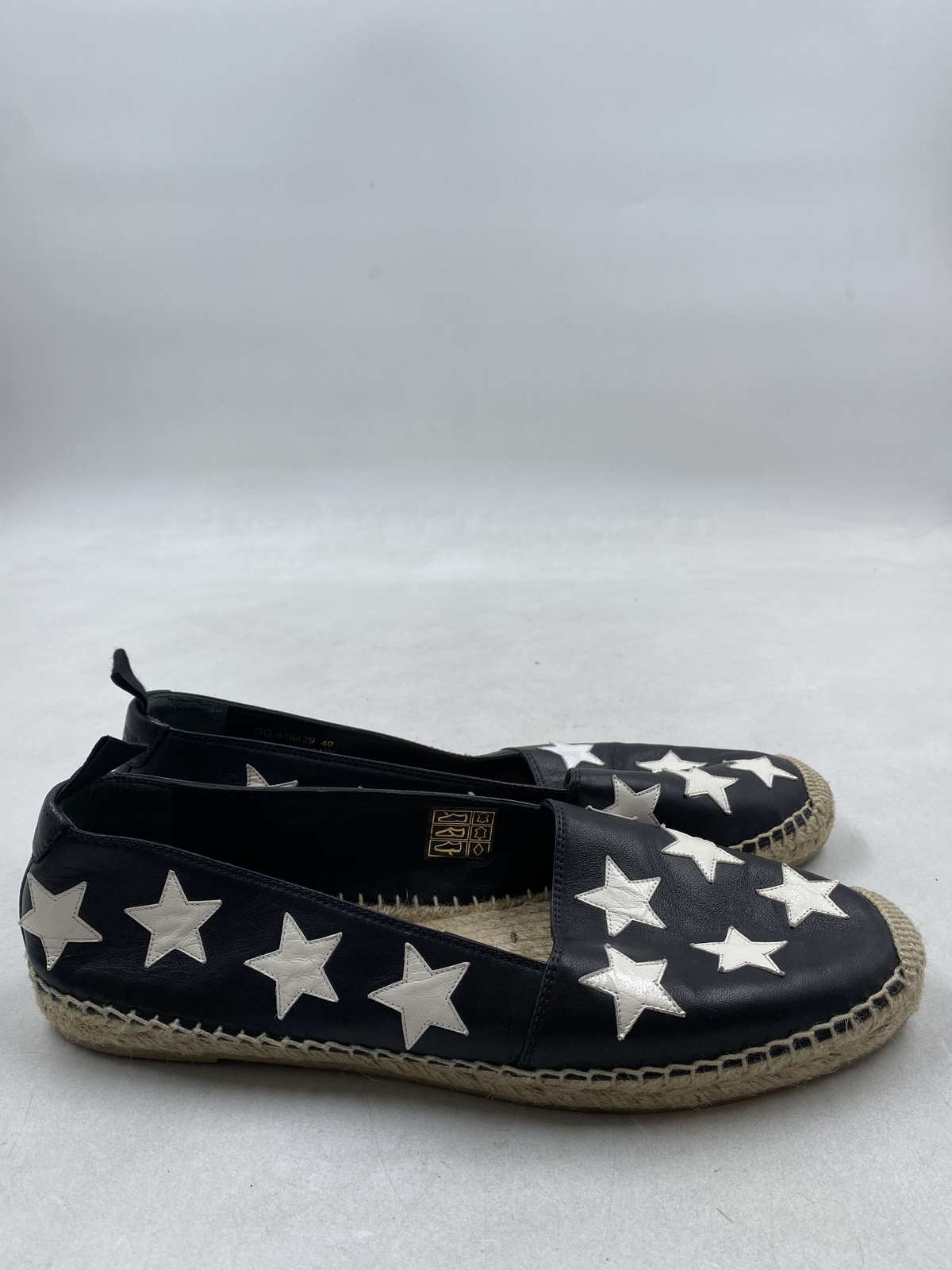 SAINT LAURENT Scarpe casual slip on Saint Lauren in pelle nera con motivo stella W 9 5