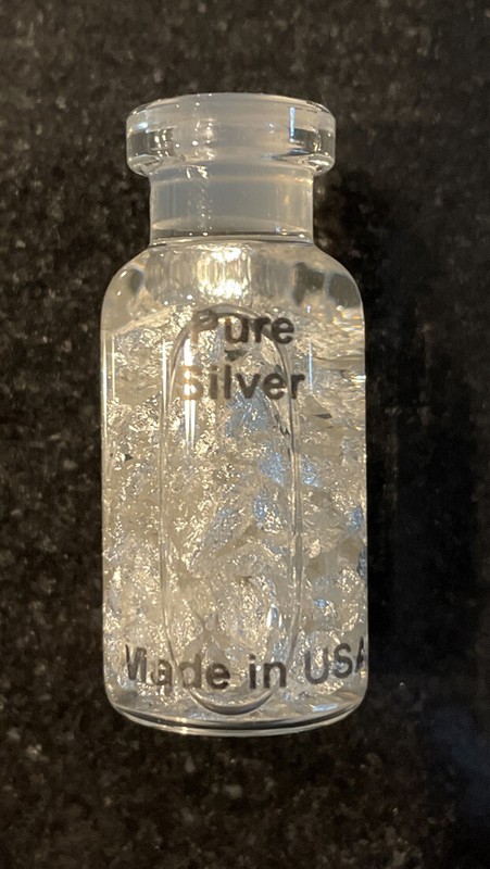 Pure Nevada Silver Leaf Flake Suspended in Sealed Glass Water Bottle, Brand New