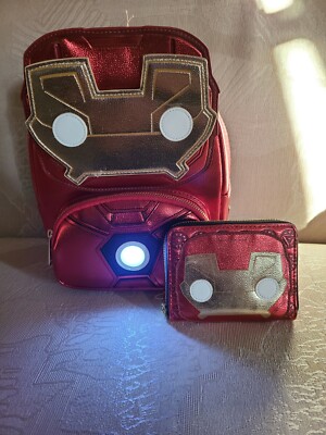 iron man mini cosplay backpack Loungefly 15th Anniversary Magical Land of Collectibles Iron Mans mask lifts up to reveal Tony Stark as the armored avenger Iron Man Light-Up Mini Backpack