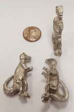 1 VINTAGE "KIRKS FOLLY" SIGNED T-REX DINOSAUR 44x22mm. CASTED METAL FINDING N540