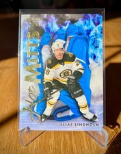 Elias Lindholm Hot Mitts 2025-26 UD Flair Hockey Bruins Case Hit #HM-2 1:125