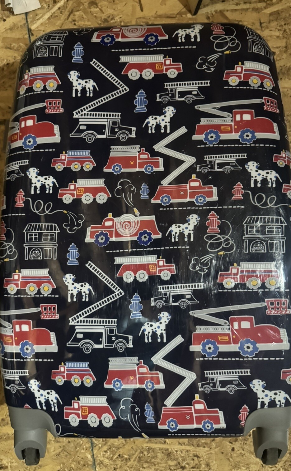 Maleta rígida giratoria Pottery Barb Kids camión de bomberos tamaño mediano