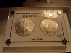 2 UNC US Silver Dollars, 1904-o Morgan,  2003 American Silver Eagle.In Holder