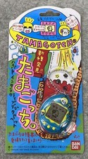 BANDAI New species discovered Tamagotchi blue x logo