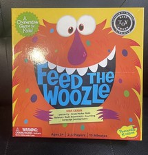Feed the Woozle Game Entire Game in box open box but 