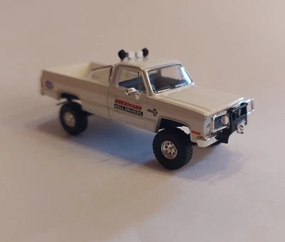 Brekina 19694 Chevy C10 GMC "Hurricane Helldrivers" white off-road BJ 1981 OVP - Bild 1 von 2