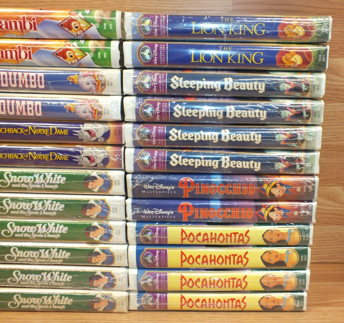 Mixed Lot of 34 Disney Classic Clamshell VHS Tapes - Bambi, Snow