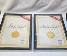 Two 5-Pack 8.5 x 11 in Document Frames, black plastic with gold trim on inside.